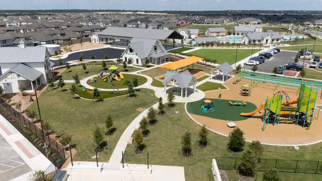 a play ground with the view of the swimming pool