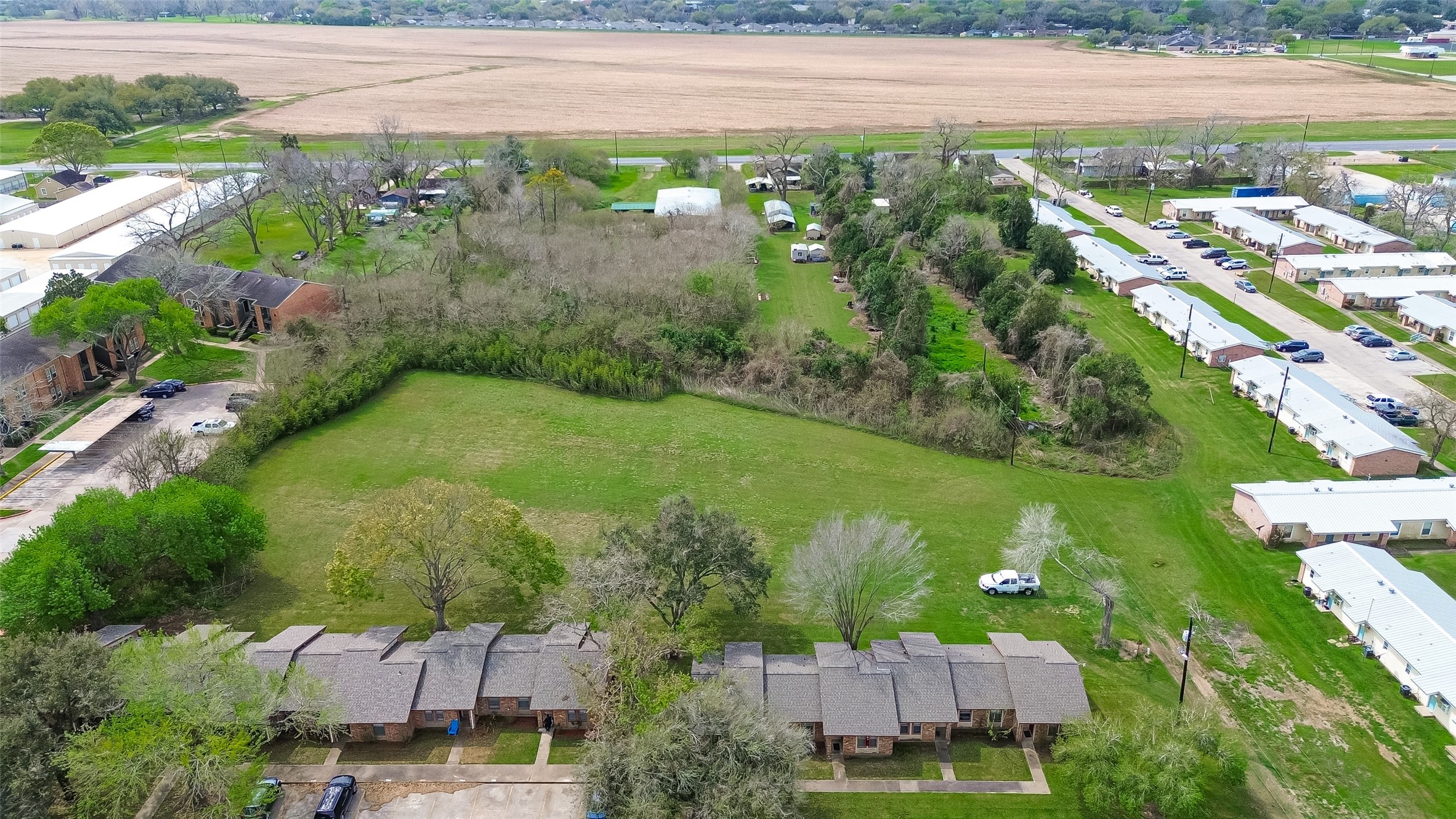 0 Red River Drive Wharton, TX 77488 - Photo 6 of 10 an aerial view of residential houses with outdoor space and river