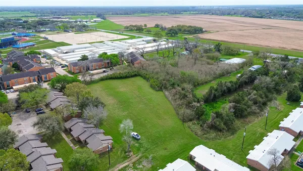 a view of a lake with a yard
