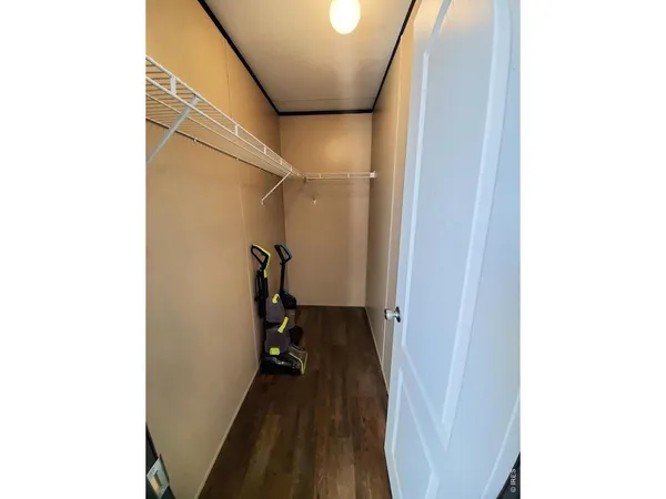 a view of a hallway with a glass door