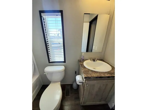 a view of a hallway with washer and dryer