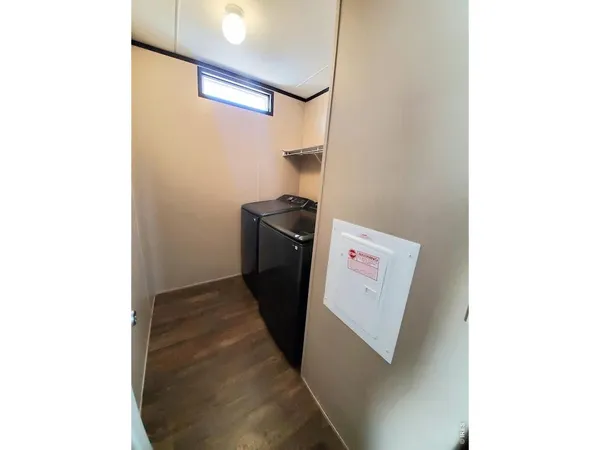 a close up of a utility room with a sink