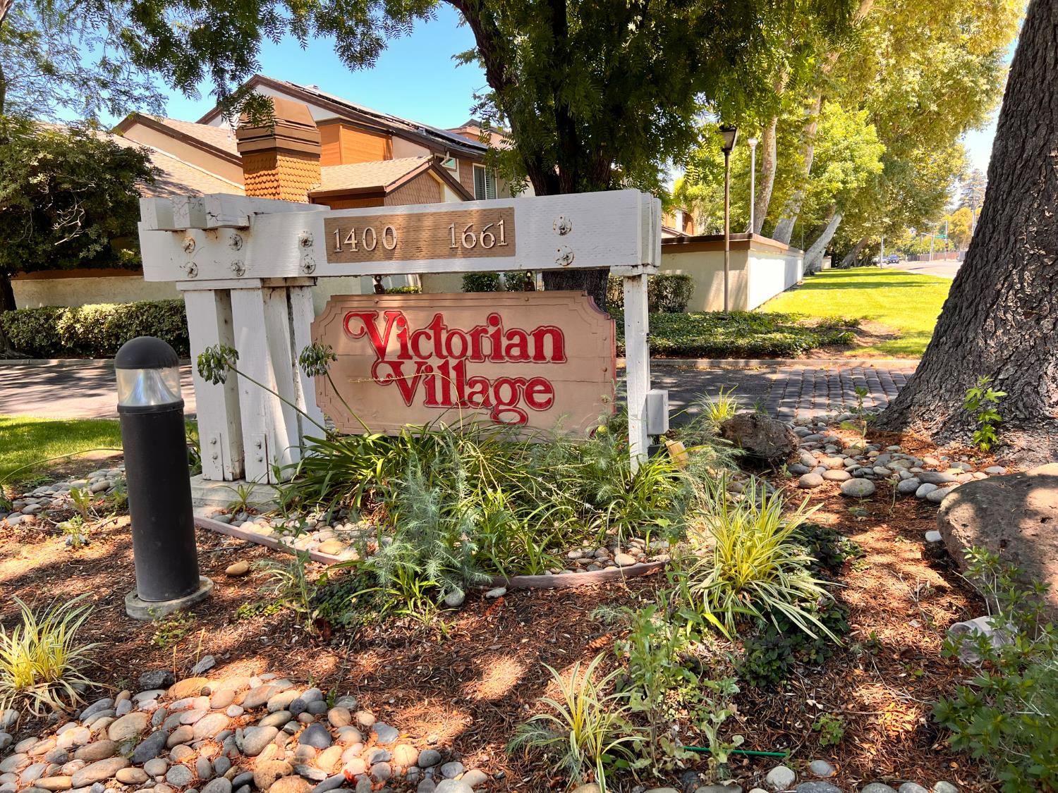 1417 West Swain Road Stockton, CA 95207 - Photo 2 of 18 a sign on the side of a road