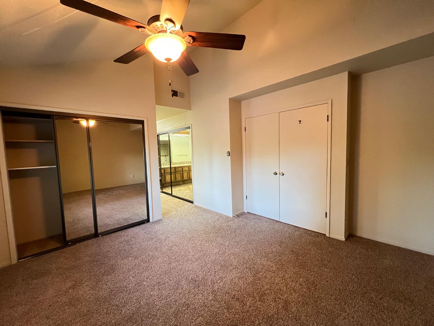 1417 West Swain Road Stockton, CA 95207 - Photo 27 of 29 a view of an empty room and a ceiling fan