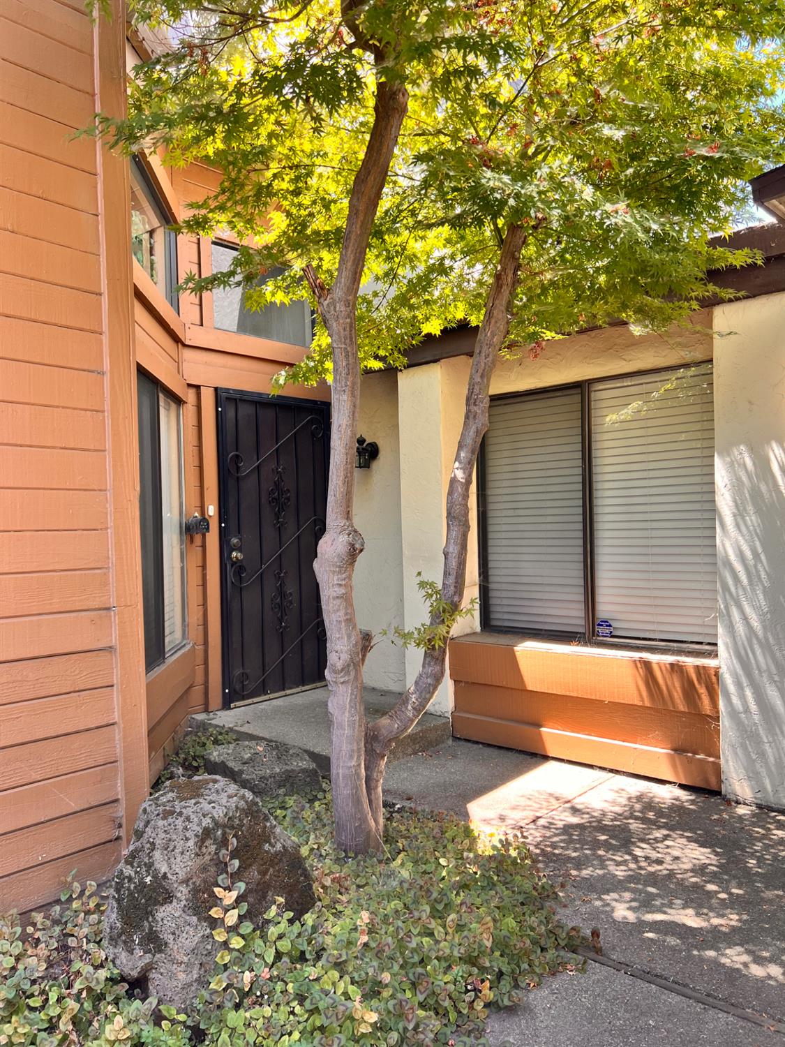 1417 West Swain Road Stockton, CA 95207 - Photo 7 of 18 a backyard of a house with seating space