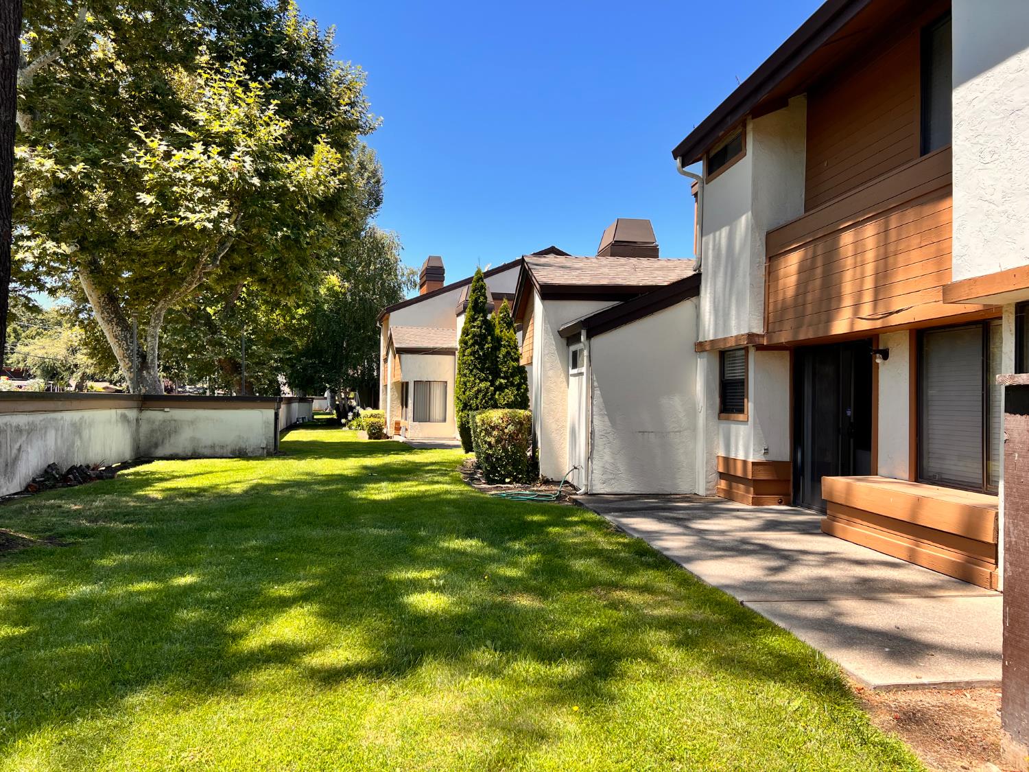 1417 West Swain Road Stockton, CA 95207 - Photo 9 of 18 a view of a house with backyard and sitting area