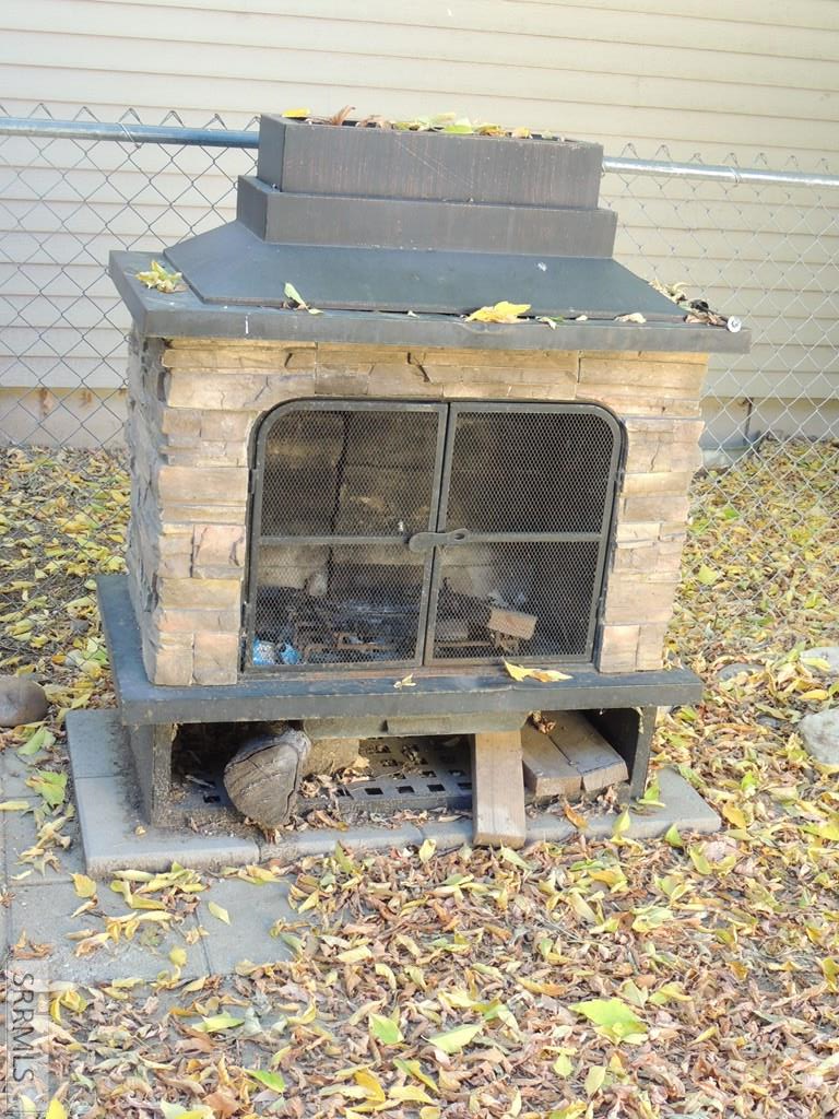 235 West 6th South, Unit 1 St. Anthony, ID 83445 - Photo 13 of 17 Freestanding fireplace for back yard adventures