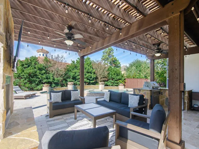 a outdoor living space with patio furniture and a potted plant