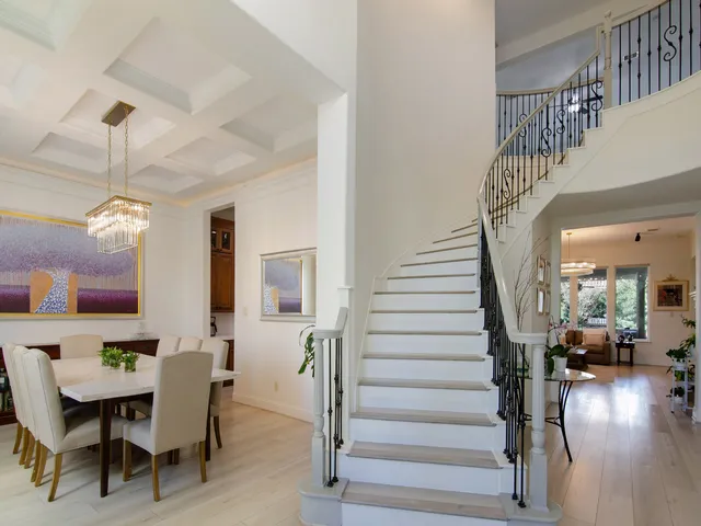 a view of a livingroom with furniture and wooden floor