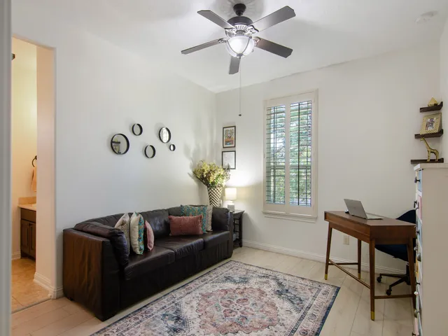 a living room with furniture and a window