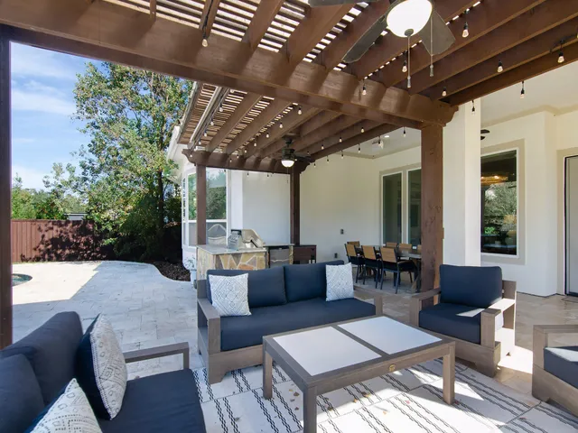 a outdoor living space with furniture and garden view