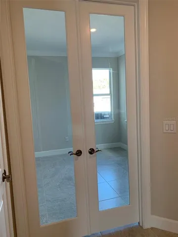 view of a bathroom with a glass door shower