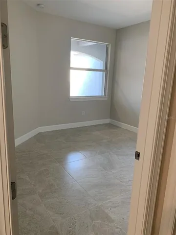 an empty room with a window