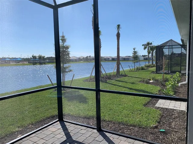 a view of a garden from a balcony