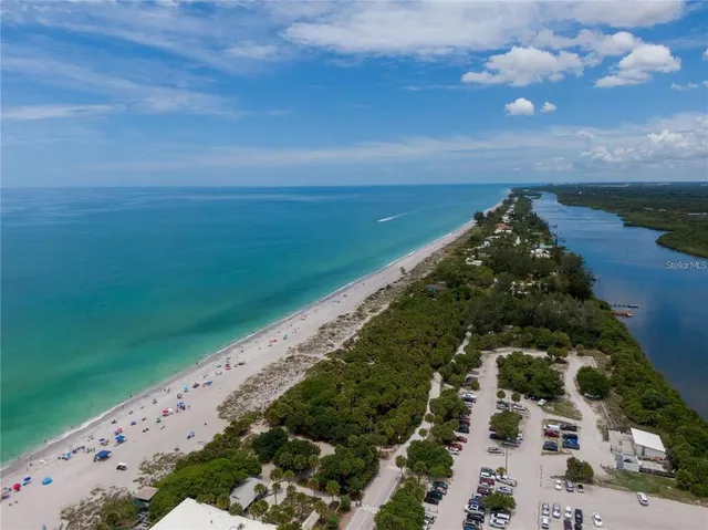 a view of a lake with a yard