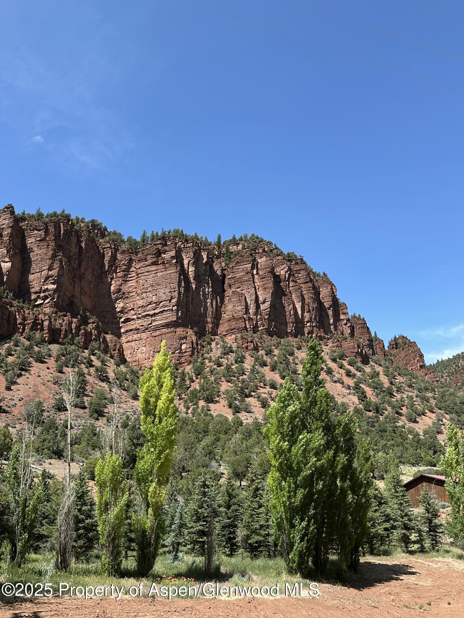 4959 Frying Pan Road Basalt, CO 81621 - Photo 12 of 20 a view of a large building with a mountain in the background