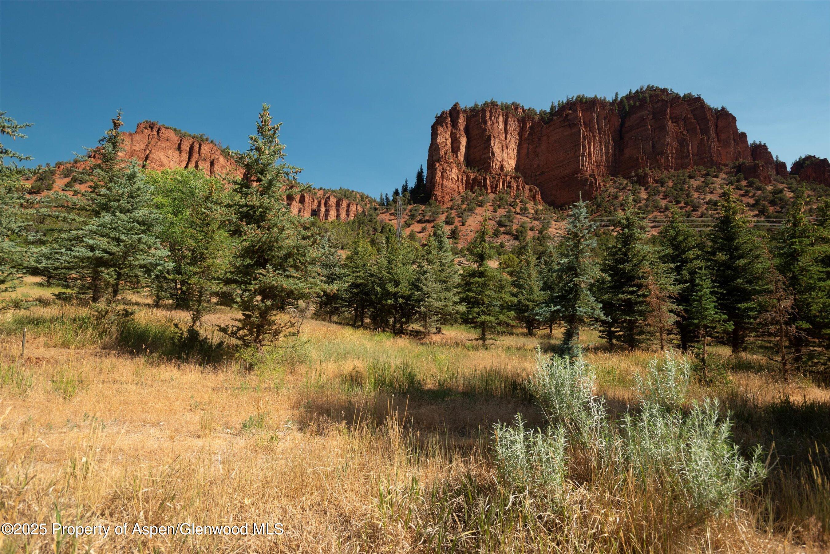 4959 Frying Pan Road Basalt, CO 81621 - Photo 18 of 20 a view of a lake with a building in the background