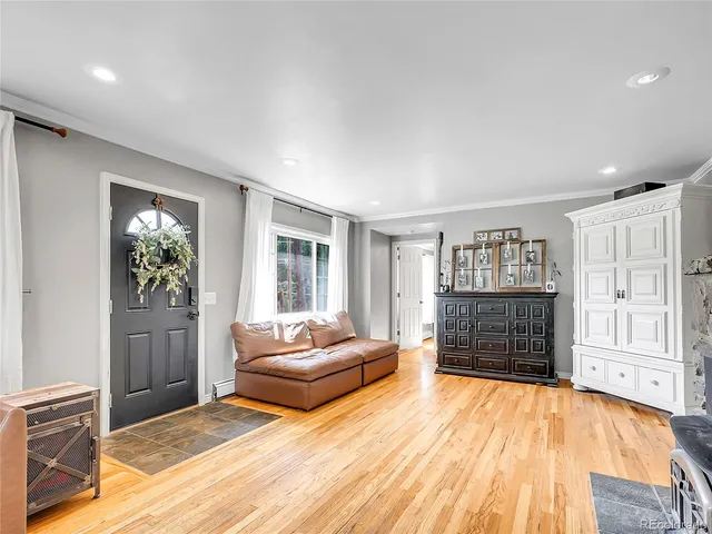 a bedroom with furniture and window