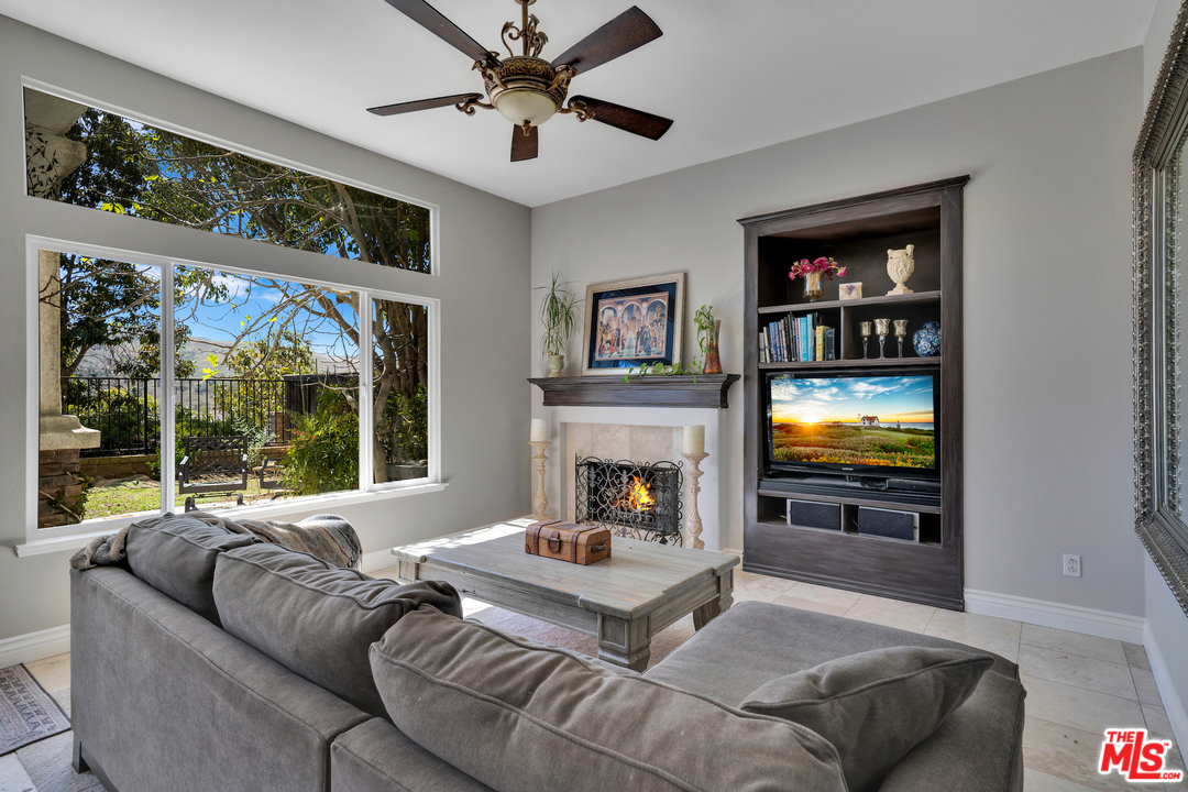 2836 Arbella Lane Thousand Oaks, CA 91362 - Photo 14 of 28 a living room with furniture and a flat screen tv