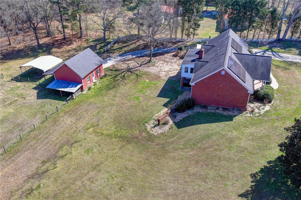 1622 New Hope Road Lawrenceville, GA 30045 - Photo 109 of 110 an aerial view of residential houses with outdoor space