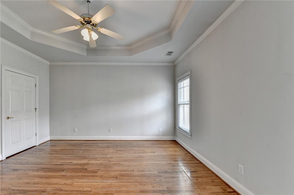 1622 New Hope Road Lawrenceville, GA 30045 - Photo 49 of 110 wooden floor in an empty room with a window