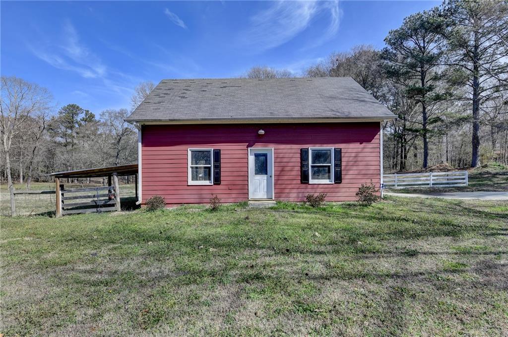 1622 New Hope Road Lawrenceville, GA 30045 - Photo 85 of 110 a view of a house with a yard
