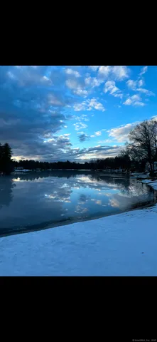 a view of lake with mountain