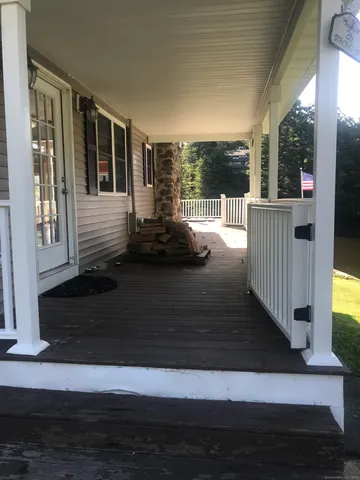 a view of porch with seating space