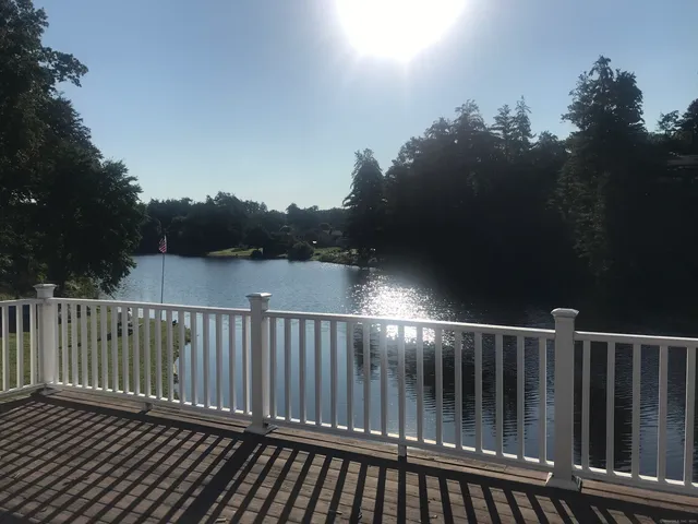 a balcony with wooden floor