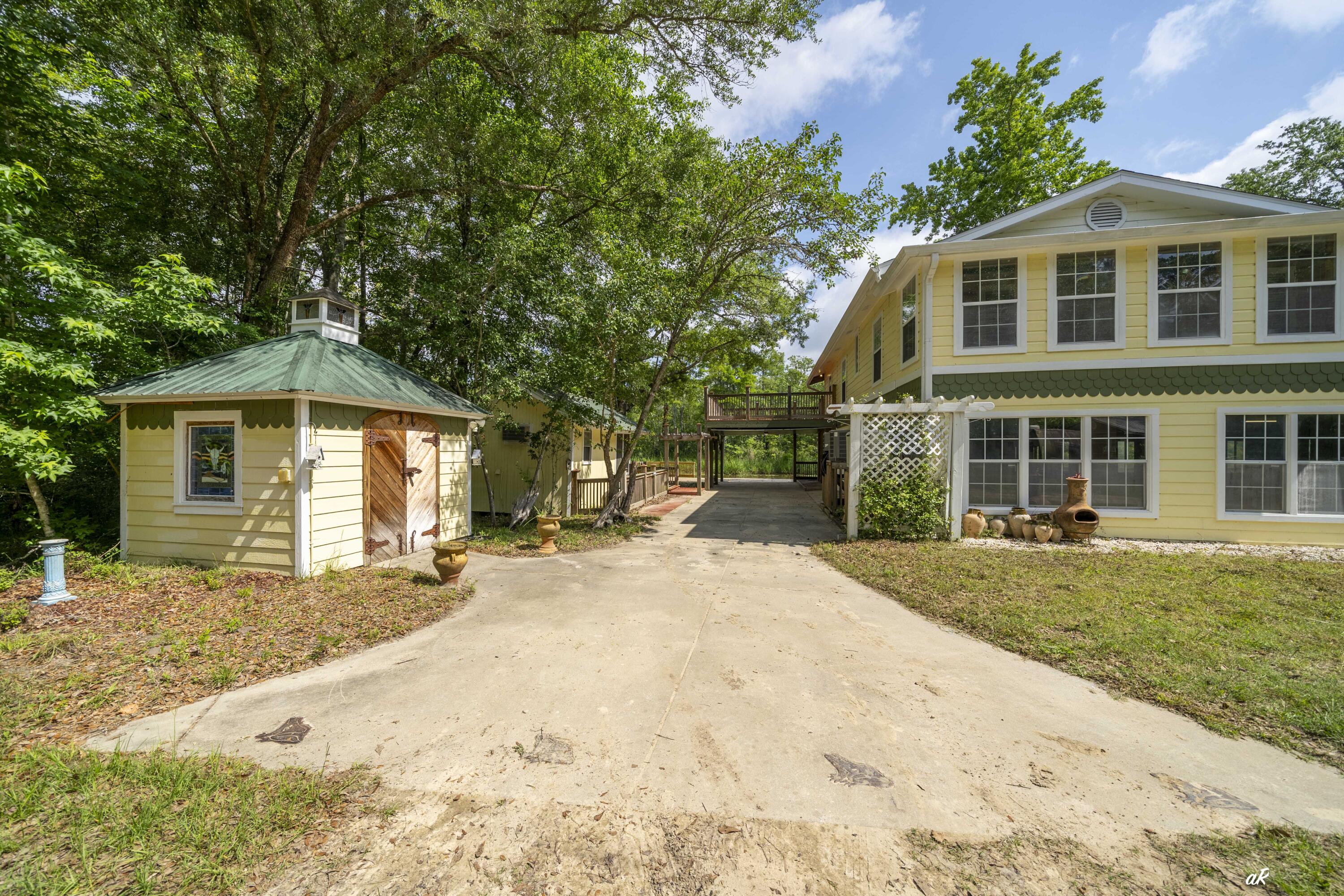 7930 Bunker Road Vernon, FL 32462 - Photo 15 of 68 Rear View Left Side of property