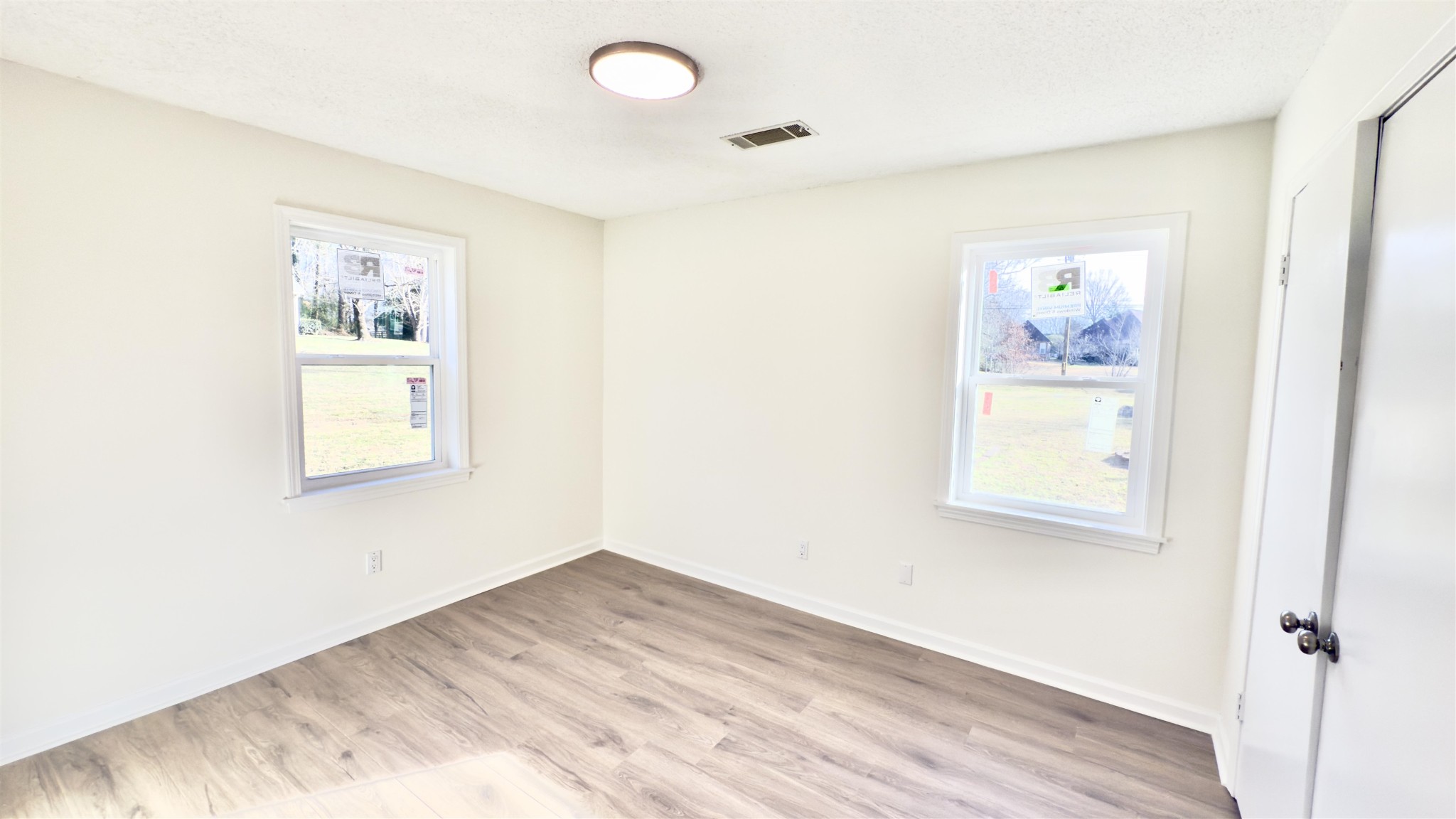 9000 Jack Bond Road Arlington, TN 38002 - Photo 13 of 19 a view of empty room with wooden floor