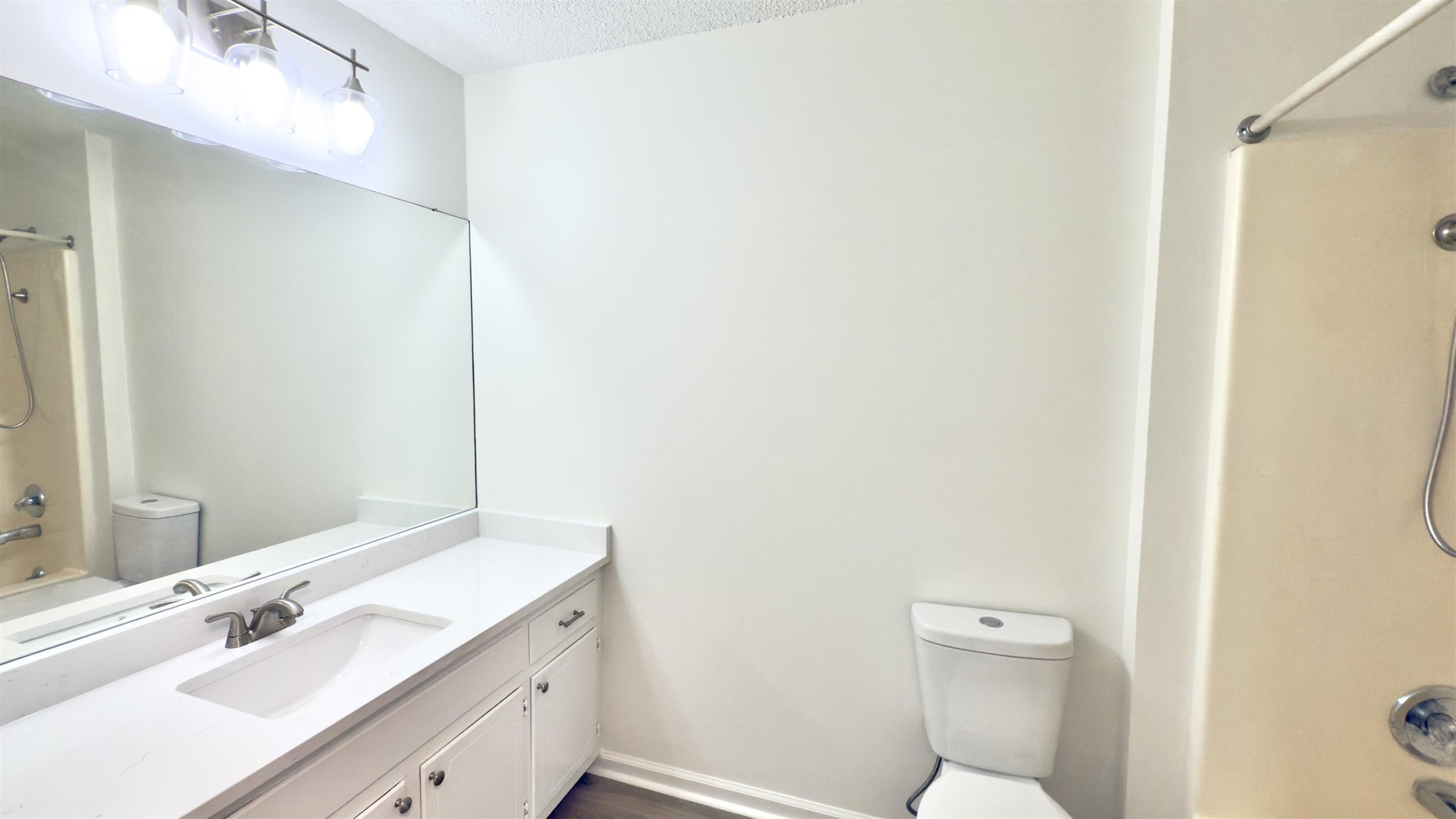 9000 Jack Bond Road Arlington, TN 38002 - Photo 14 of 19 a bathroom with a sink mirror vanity and toilet