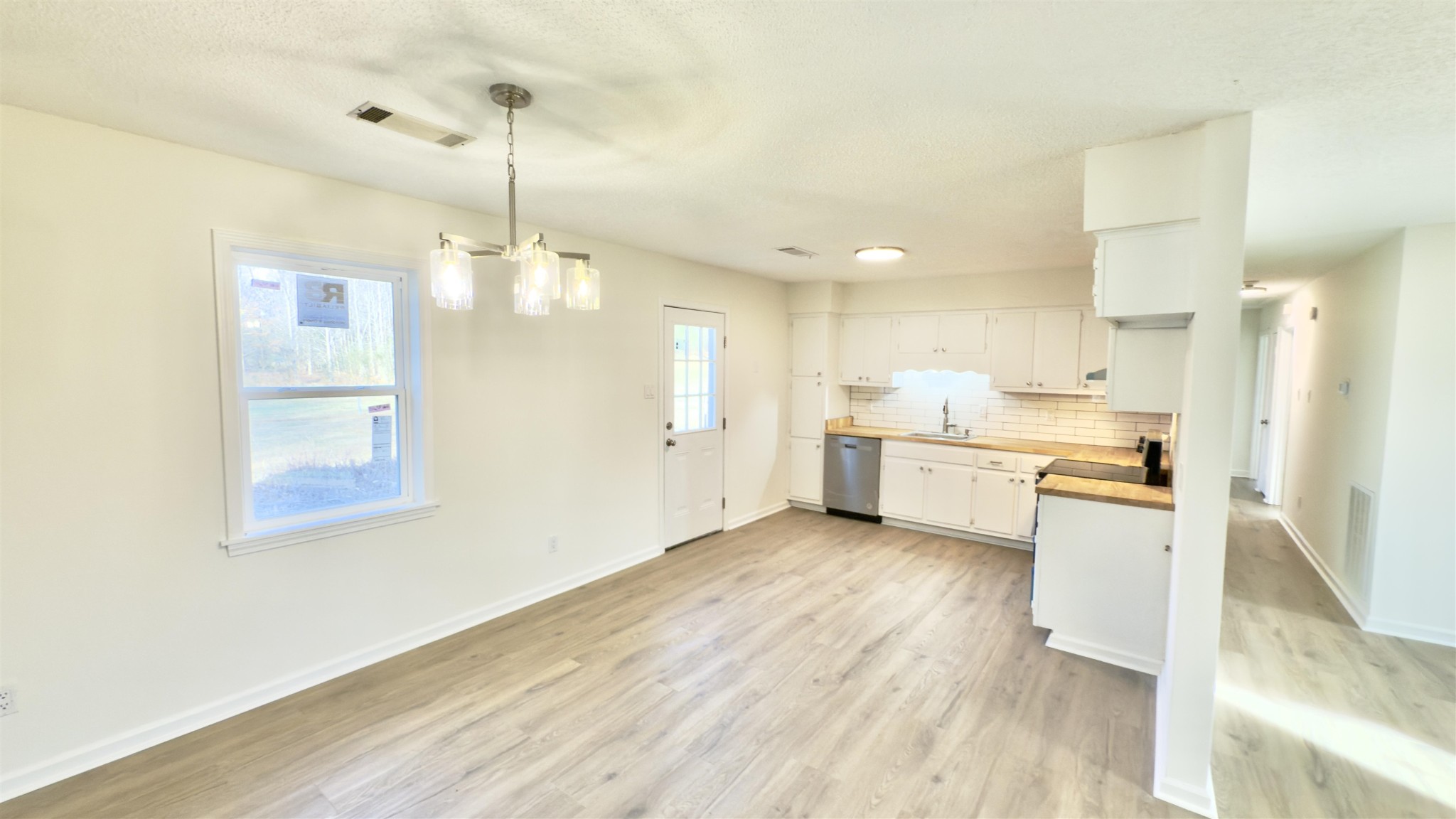 9000 Jack Bond Road Arlington, TN 38002 - Photo 6 of 19 a view of a kitchen with wooden floor and a window