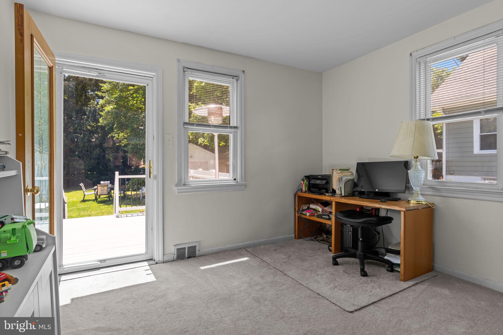 339 Pitman Avenue Pitman, NJ 08071 - Photo 12 of 25 a view of a workspace with furniture and a window