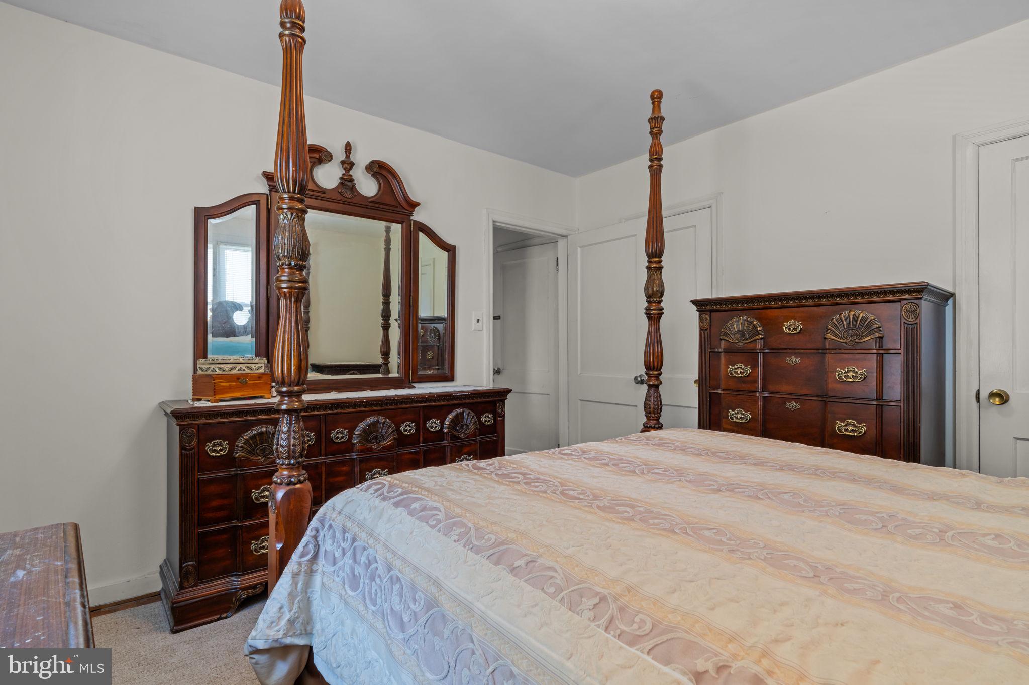 339 Pitman Avenue Pitman, NJ 08071 - Photo 15 of 25 a bedroom with a bed and a dresser
