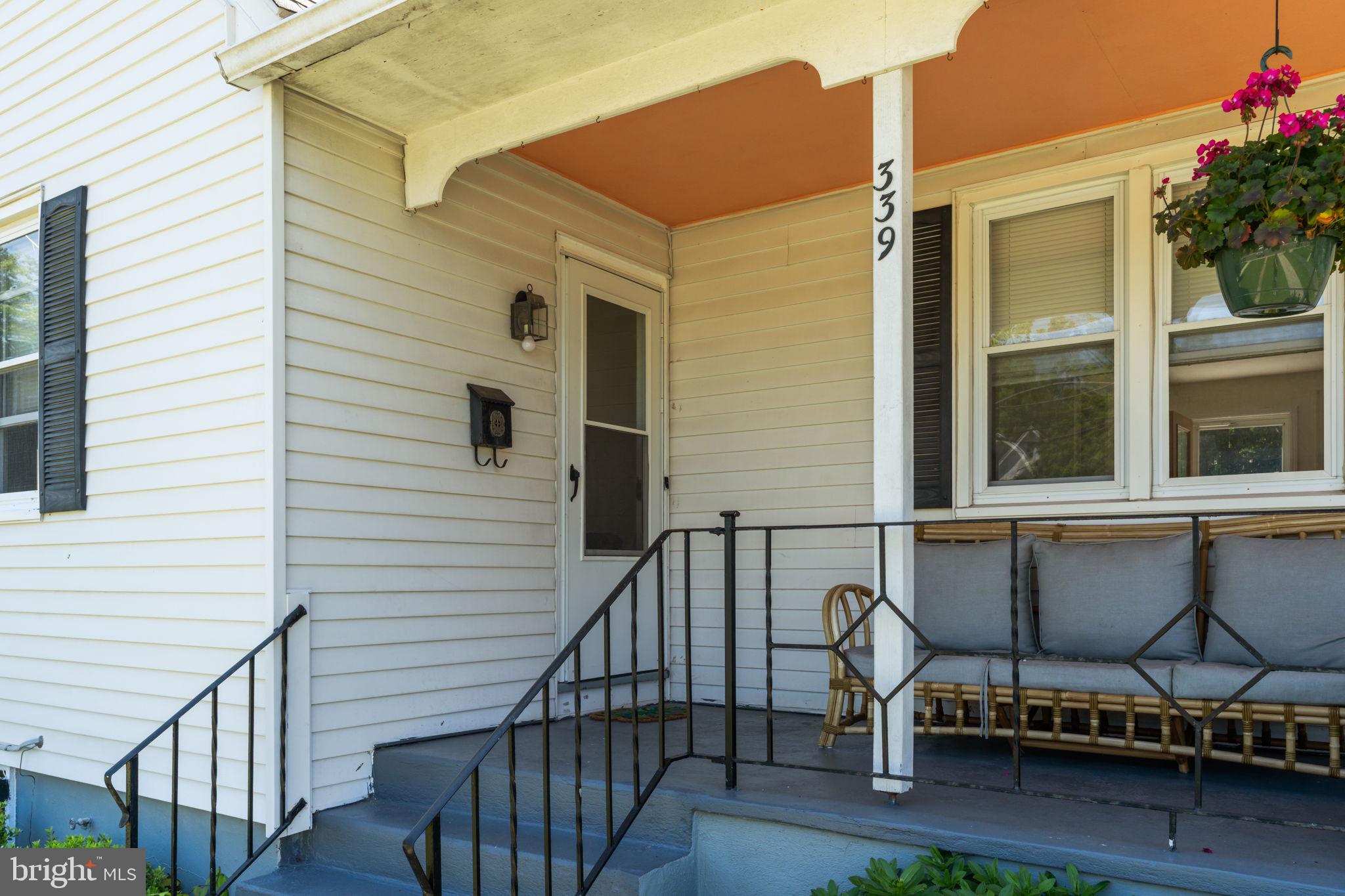 339 Pitman Avenue Pitman, NJ 08071 - Photo 3 of 25 a view of a balcony with chairs