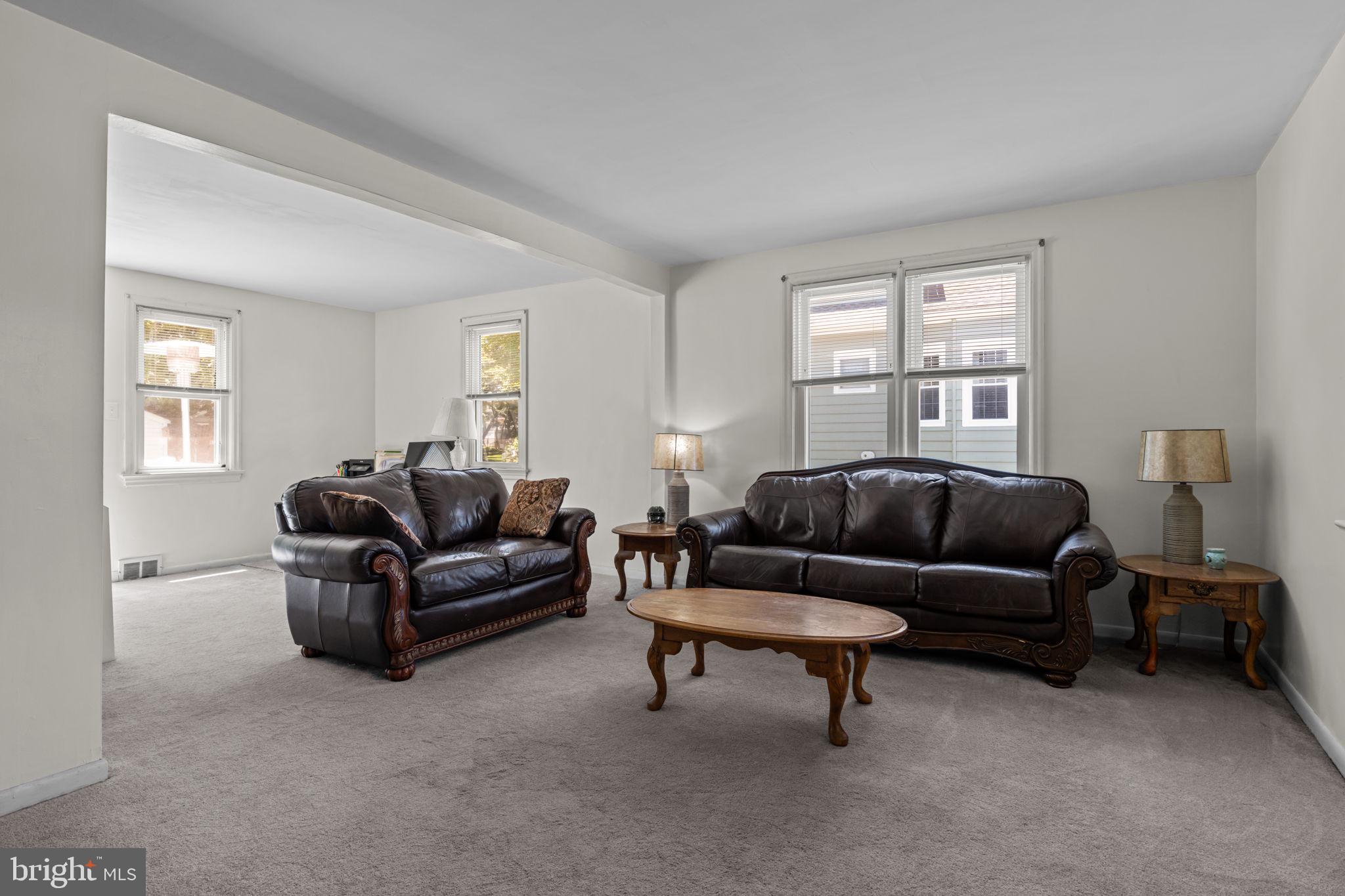 339 Pitman Avenue Pitman, NJ 08071 - Photo 10 of 25 a living room with furniture and a window