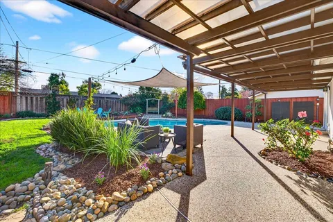 a view of a swimming pool and outdoor space