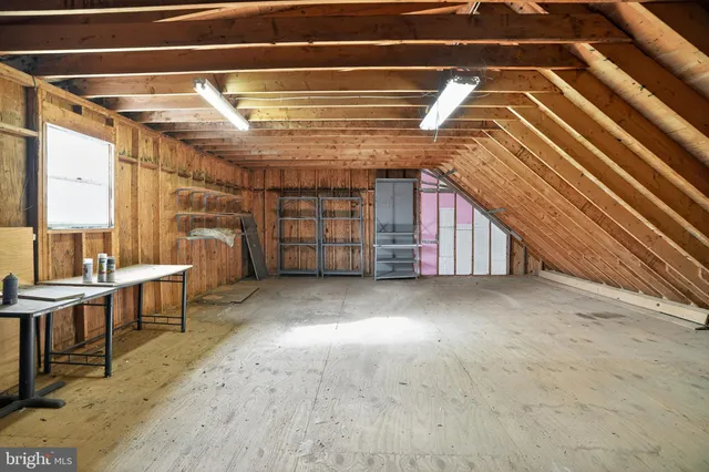 a house that has a tree in front of it