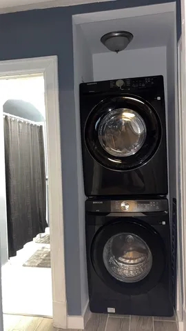 a stove top oven sitting inside of a kitchen