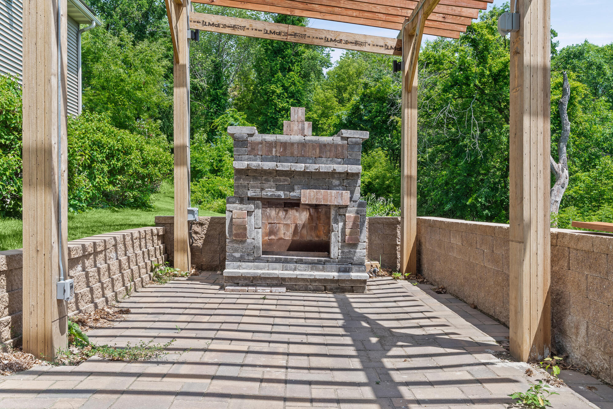 N5076 Wildflower Lane Hamilton, WI 54669 - Photo 49 of 56 Newer Pergola/fire area