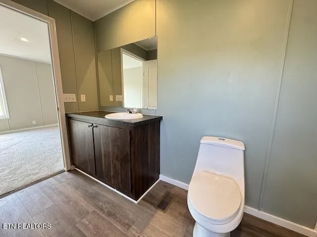 a bathroom with a toilet and a bathtub