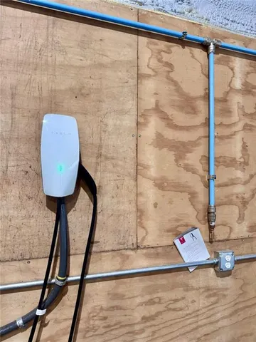 a view of swimming pool is middle in the garden