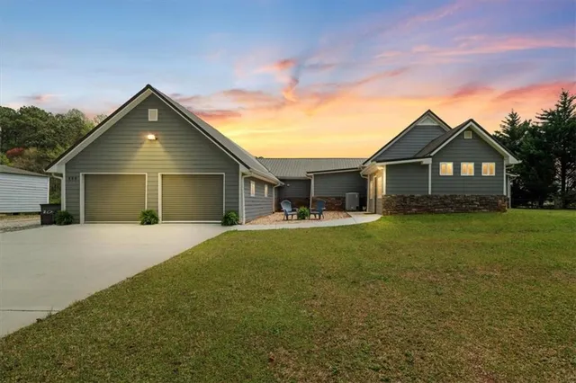 an aerial view of residential house with outdoor space