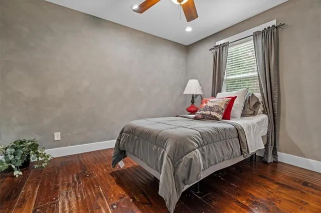 a view of an empty room with a fireplace