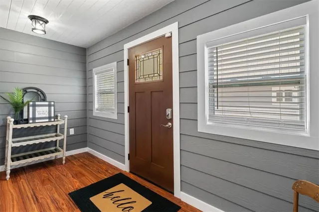 a view of a swimming pool with a yard