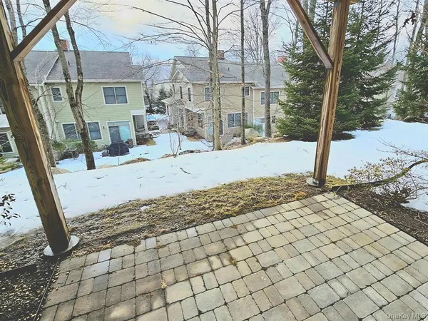 a view of a backyard of the house