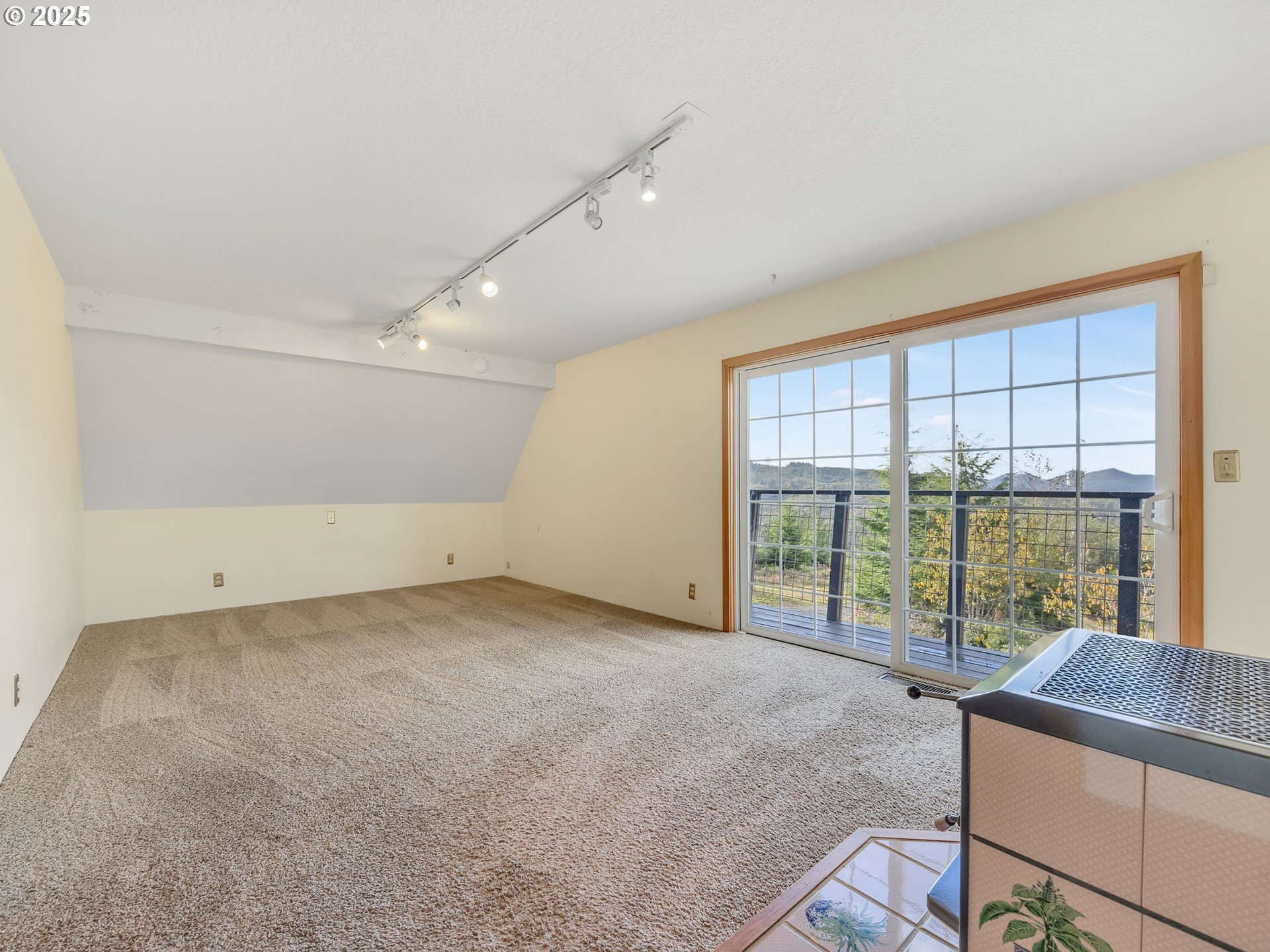 37555 Hauger Mountain Lane Seaside, OR 97138 - Photo 22 of 32 an empty room with large windows