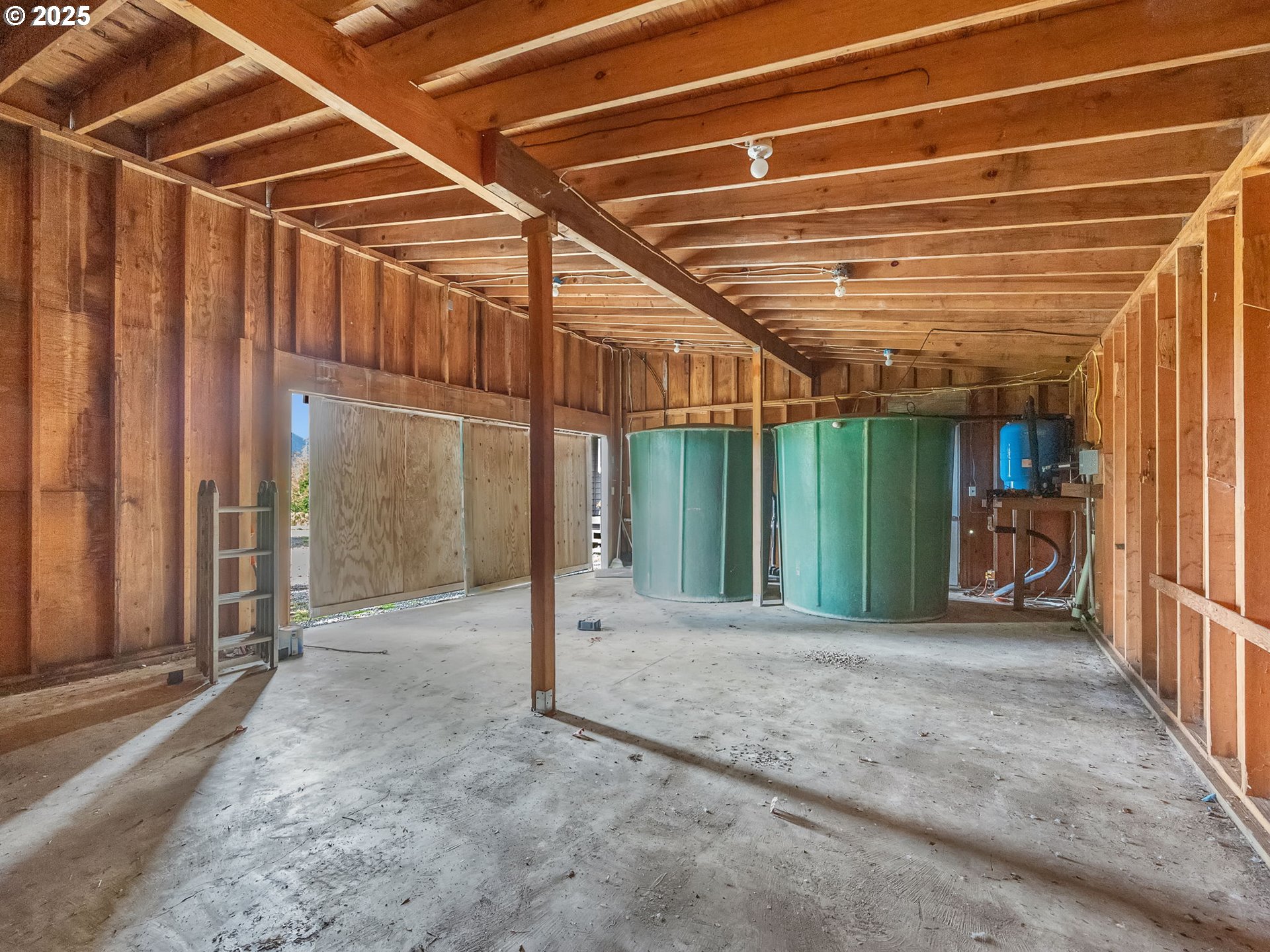 37555 Hauger Mountain Lane Seaside, OR 97138 - Photo 31 of 32 a view of a room with wooden walls