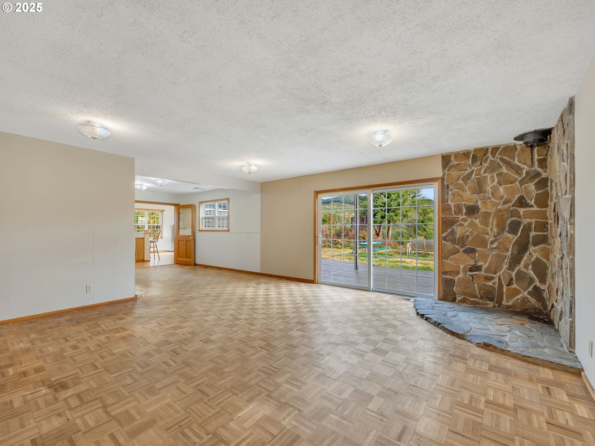 37555 Hauger Mountain Lane Seaside, OR 97138 - Photo 7 of 32 a view of an empty room with a window